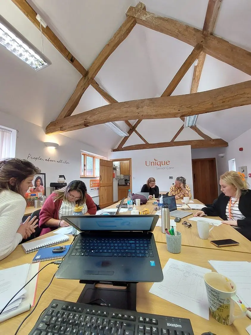 Carers engaged in care job training