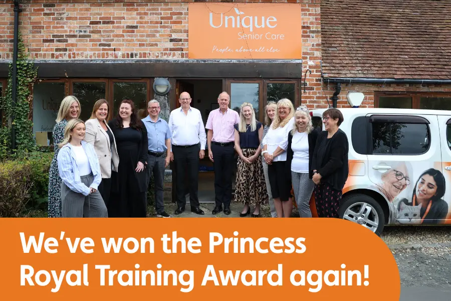 Thumbnail image for blog about our latest Princess Royal Training Award win for our live-in Caregiver induction. Image features some of our team stood outside the Unique Senior care head office