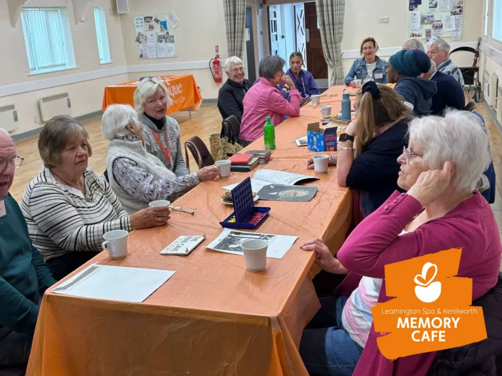 Image of attendees enjoying activities at the Leamington Spa and Kenilworth memory cafe