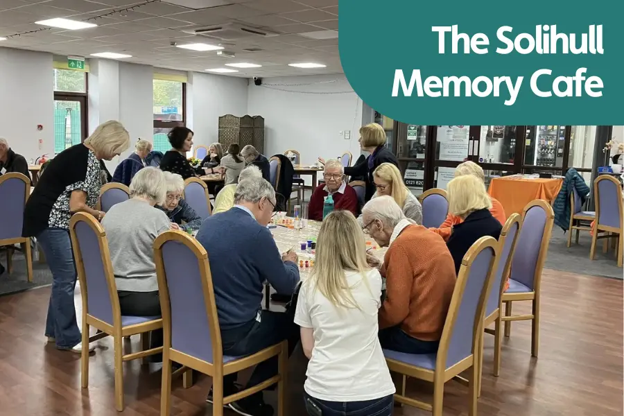 Featured image for the Solihull memory cafe - Image shows attendees at the Solihull memory cafe enjoying an activity