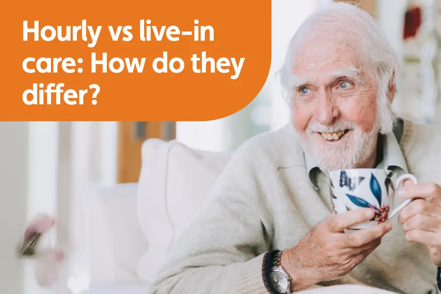 Featured image for blog title 'hourly vs live in care: how do they differ. Shows elderly gentleman smiling while sat on the sofa holding a cup of tea.