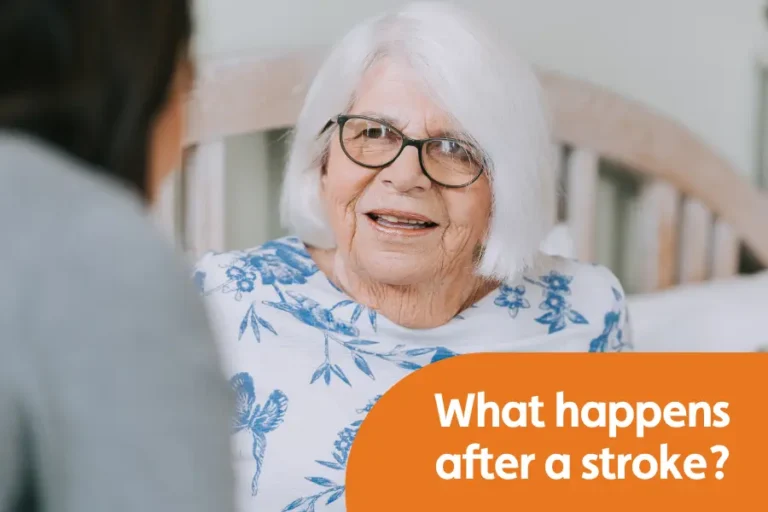 Elderly woman smiling at someone out of shot. text overlay says 'what happens after a stroke'