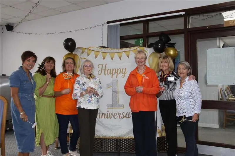 Staff and volunteers celebrating the solihull memory cafes first birthday