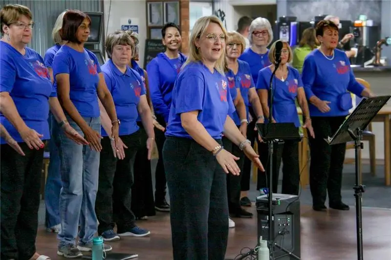 SOlihull pop choir performing at the memory cafes 1st birthday